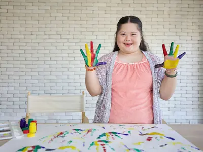 Inclusion Camper being super creative during our Creative Cove Camp