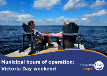 Municipal hours of operation for Victoria Day (May 19) with a couple sitting at the end of their dock