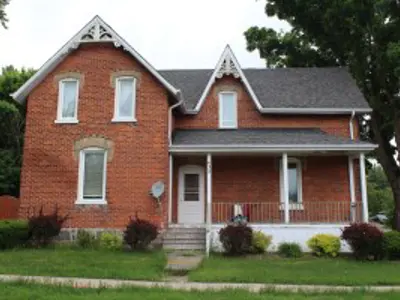 Small historic red brick house