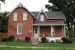 Small historic red brick house