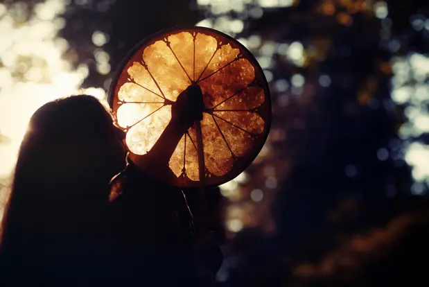Indigenous woman with a drum