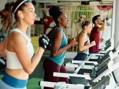 Fitness Members enjoying the treadmills