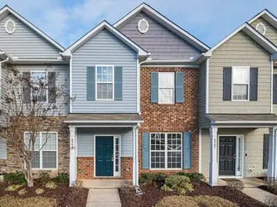 Row of houses with doors and windows