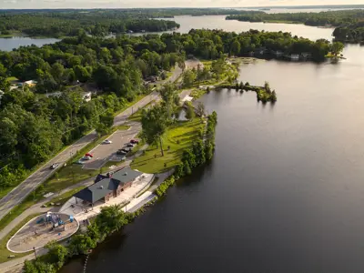 Aerial view of park, trees and water