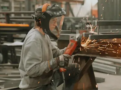 individual working in manufacturing facility 