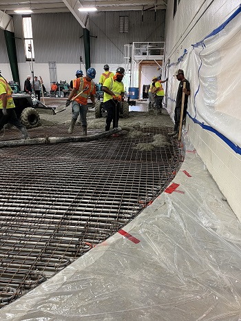 workers updating Omemee arena ice pad