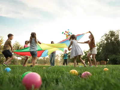 campers playing with a kite