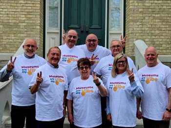 Council wearing Museums are my Vibe tee shirts outside of City Hall