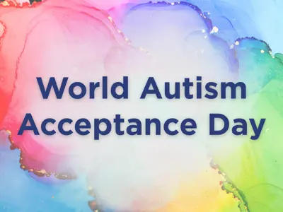A rainbow-coloured watercolour background with text reading 'World Autism Acceptance Day'