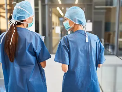 two doctors talking in a hospital