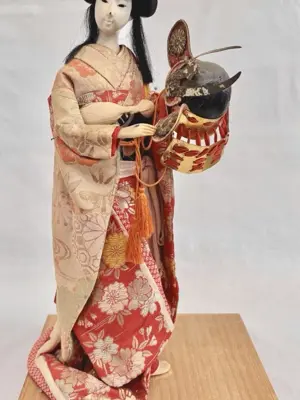 Japanese figurine on a stand