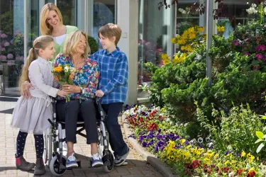 lady with family in wheelchair